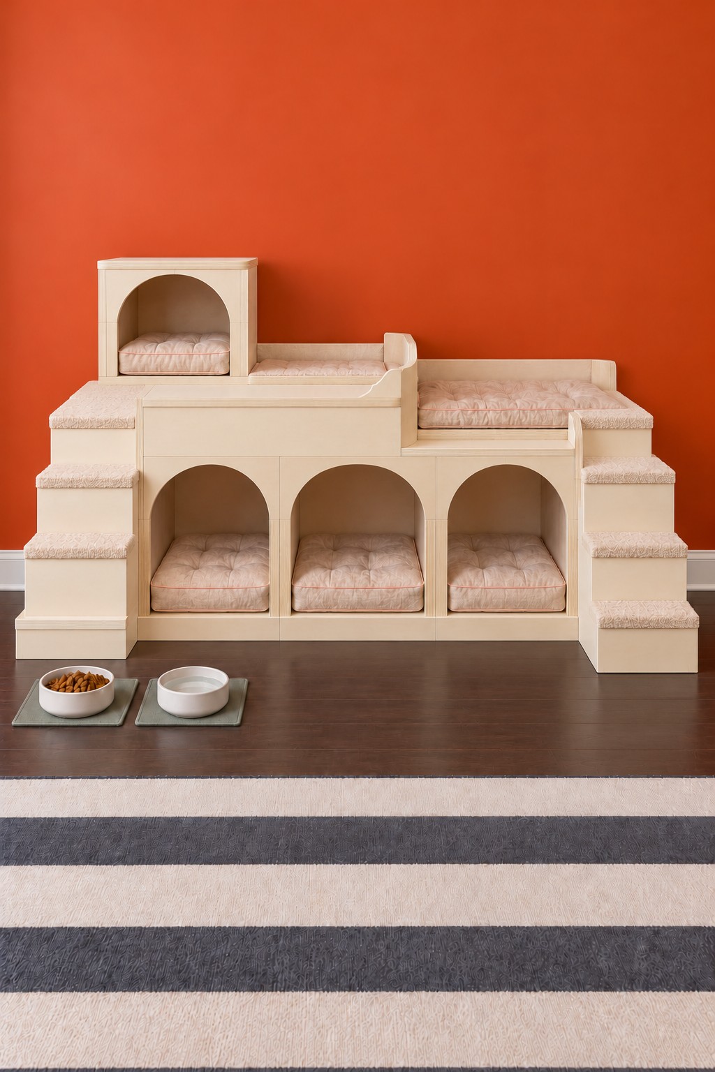 Cream cat village with three arched dens, terraced pink beds, a small upper house, and stairs at both ends