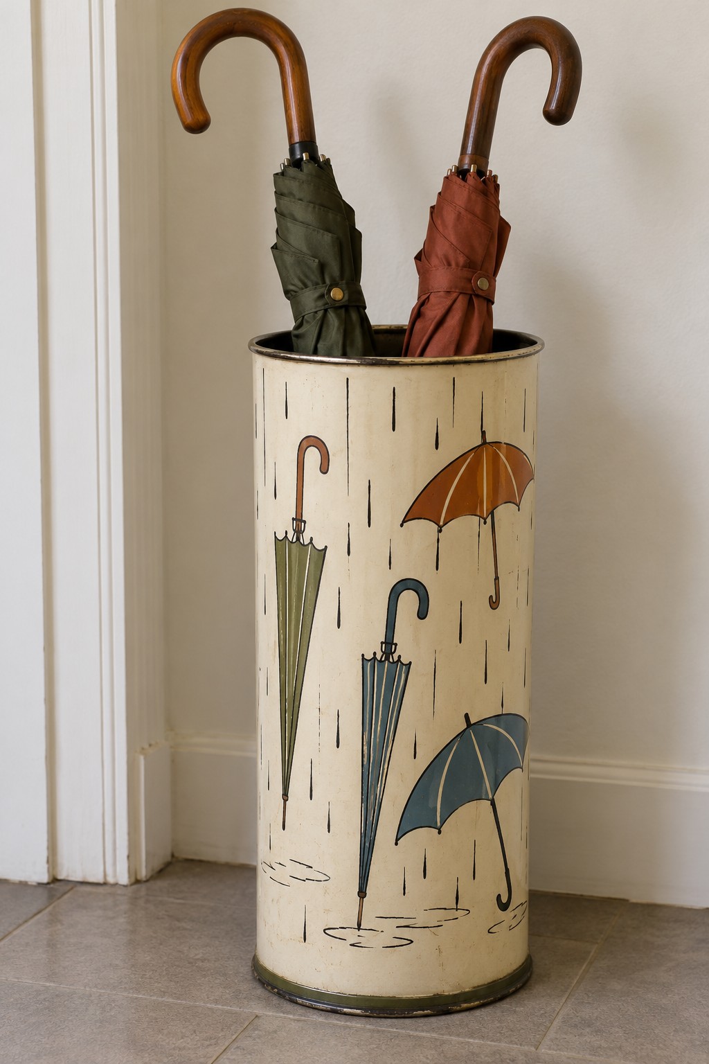 Tall cream umbrella stand painted with colorful umbrellas and fine falling rain marks