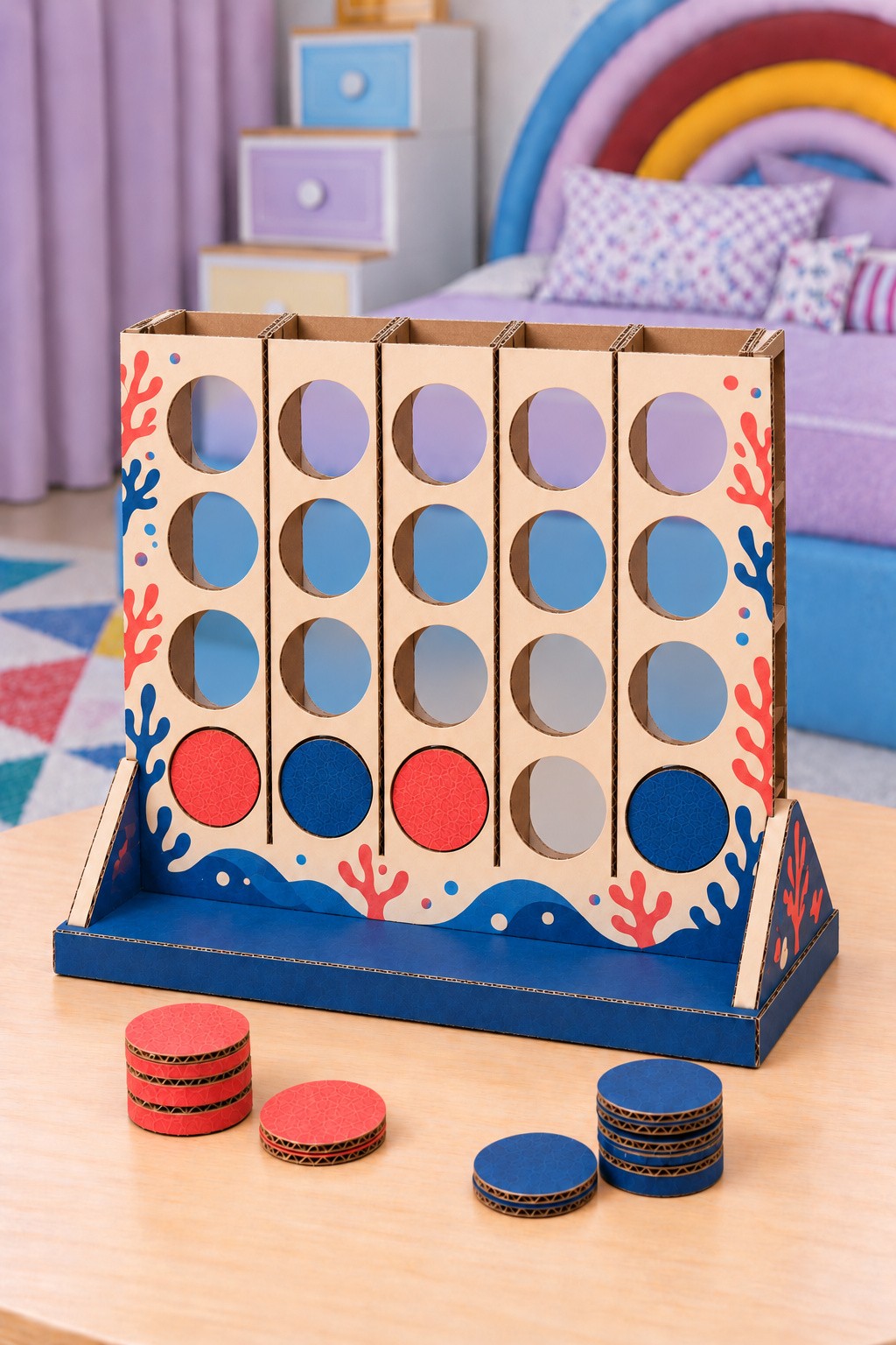 Cardboard ocean disc game with five open top loading channels, four viewing windows per channel and red and blue discs