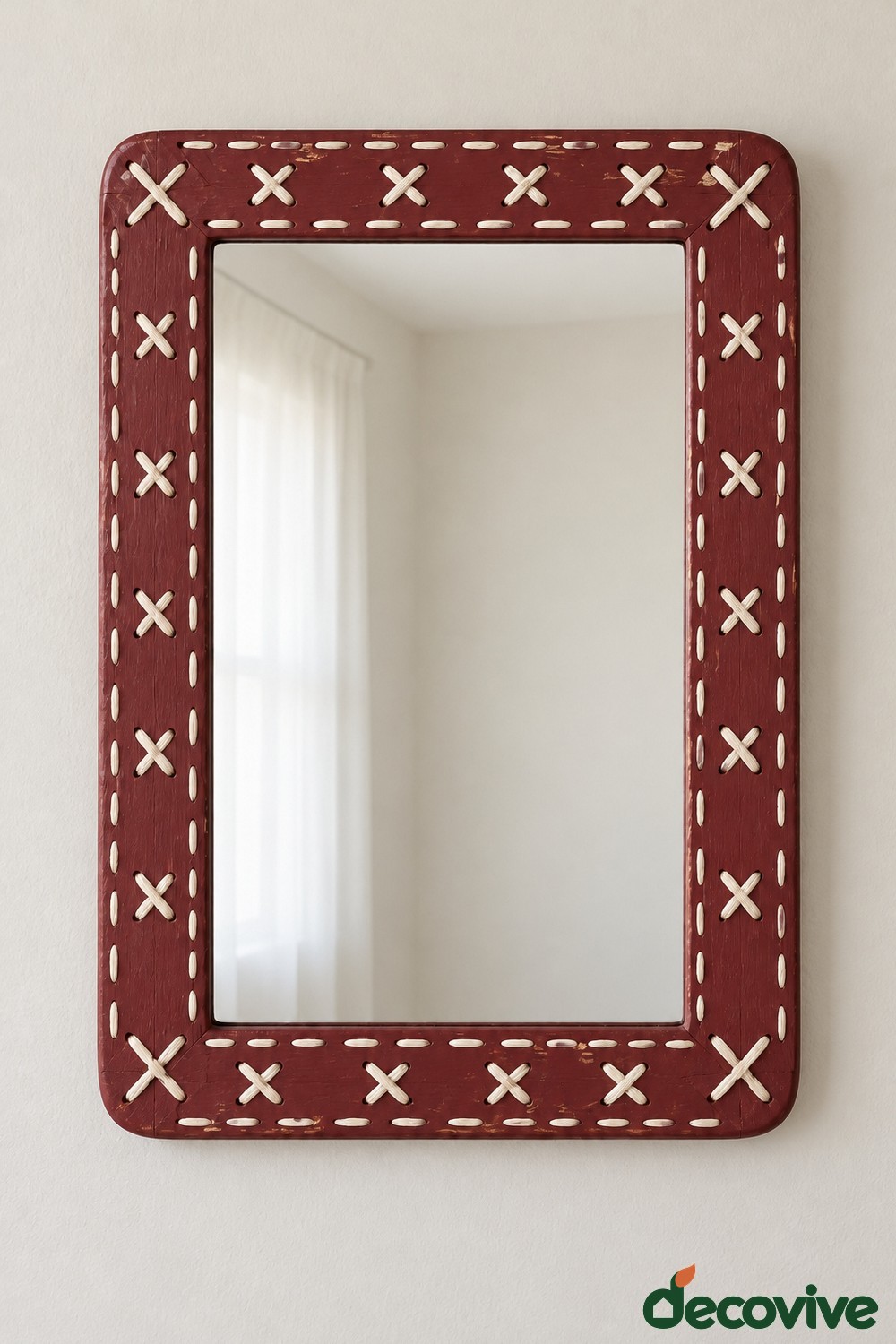 Burgundy rectangular mirror frame with cream running stitches and large cross stitches