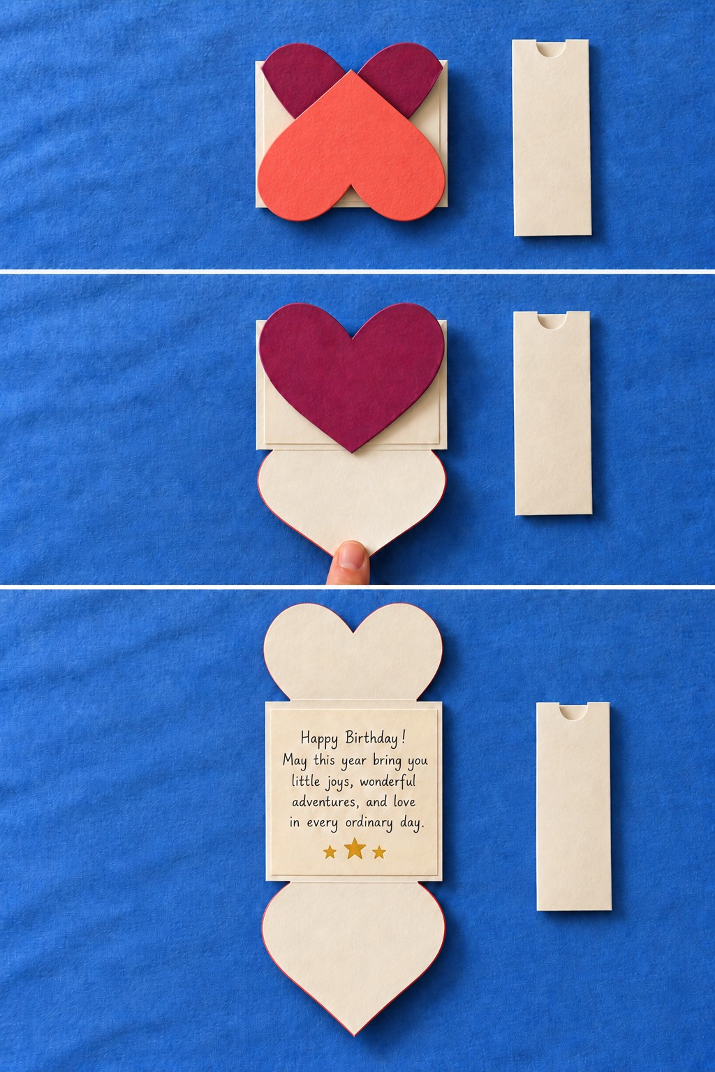 Three stages of a burgundy and coral folded heart note opening beside a cream sleeve