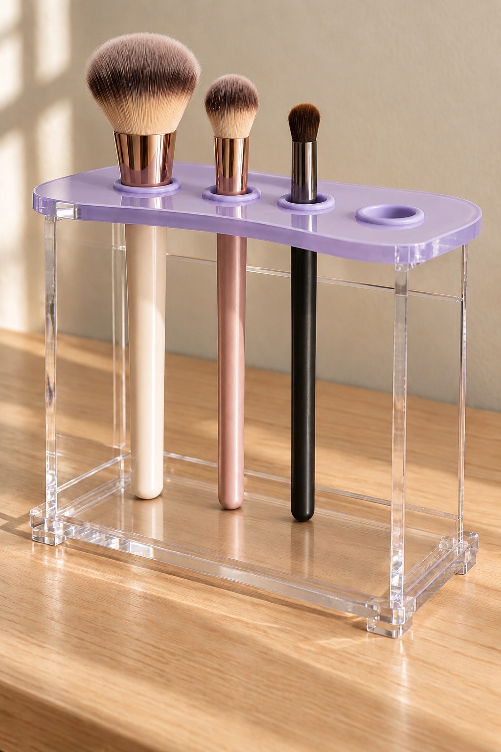 Lilac acrylic makeup brush rack with circular openings clear sides and a supporting base